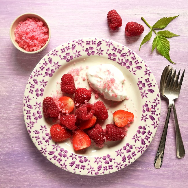 Dessert_plate_of_fresh_raspberries_and_strawberries_with_coconut_yogurt_and_raspberry_sugar